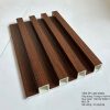Tấm ốp lam sóng nhựa giả gỗ mã 29 màu óc chó đậm với 5 sóng cao, cấu trúc rỗng, dùng để trang trí tường và trần nội thất sang trọng